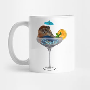 Slow loris. Cheers! Fat and funny is sitting in a cocktail glass with cocktail umbrella Mug